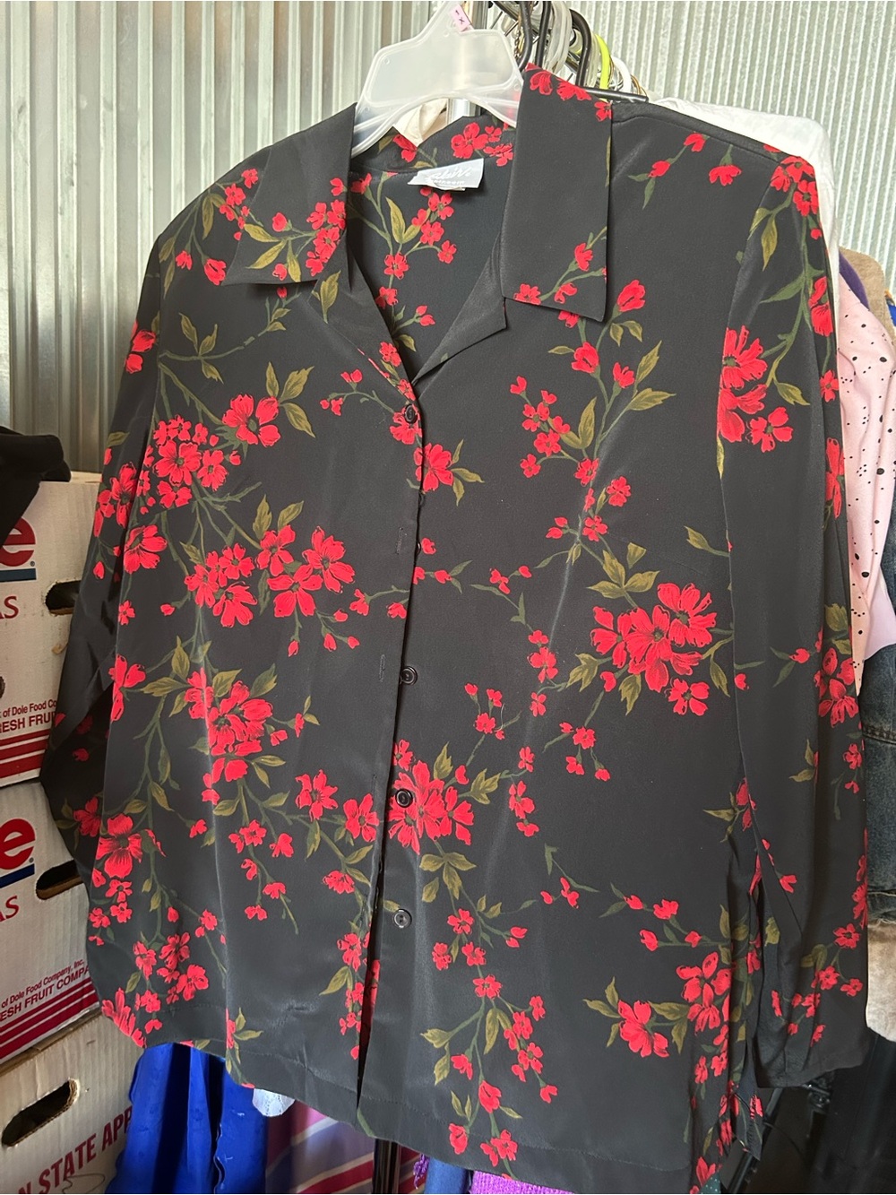 black blouse from Blair  features a vibrant red floral print